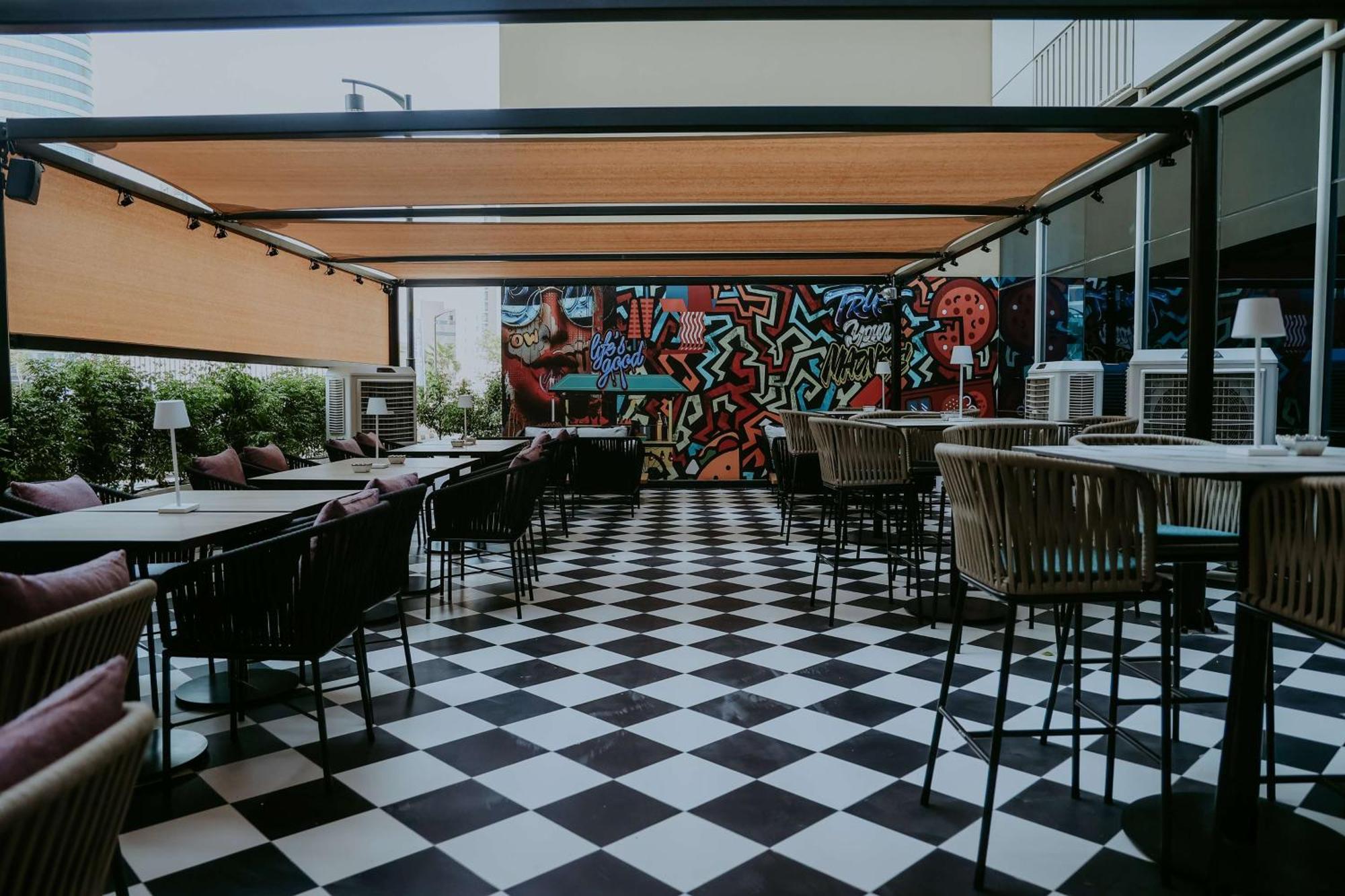 Doubletree By Hilton Fujairah City Экстерьер фото The interior of the restaurant